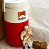 Significant Objects: Marlboro Thermos ($5), Doll ($5), Wooden Thing ($1)